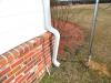 Downspout not extending far enough away from foundation.  Madison, Mississippi
