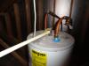 The Pressure Relief Valve (TPR) on an electric water heater should extend down...not out!  Madison, Mississippi