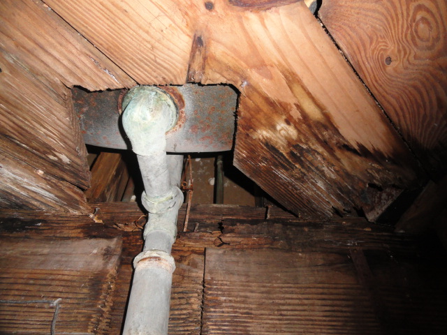 Water leak under the tub in the crawlspace noticed during a Jackson home inspection
