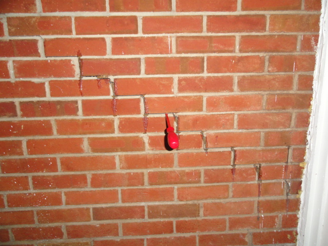 Step crack in brick veneer wall in Brandon, Mississippi